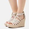 MICHAEL Michael Kors Bradley Wedge - Sandales À Talons Hauts - Vanilla -Magasin Général De Mode 52de46d371c94293a5d005a1a3fb53ab
