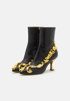 MOSCHINO Bottines - Nero 9 MOSCHINO Bottines - Nero -Magasin Général De Mode 68434e46e79e4aca9aa94825401b2102