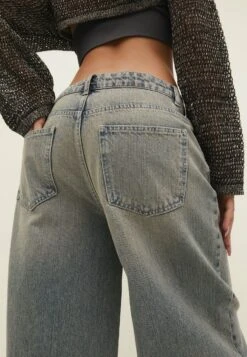 Stradivarius Baggy - Jean Flare - Dirty Denim -Magasin Général De Mode 812cf8fcb05a4858ac434c19beb51979