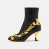 MOSCHINO Bottines - Nero -Magasin Général De Mode d96a0b5d2d9b4e659b91c219ab9d4ab8